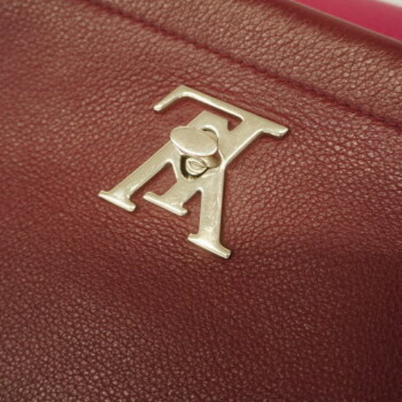 Louis Vuitton Taurillon Lock Me Shoulder Bag - Picture 7 of 11